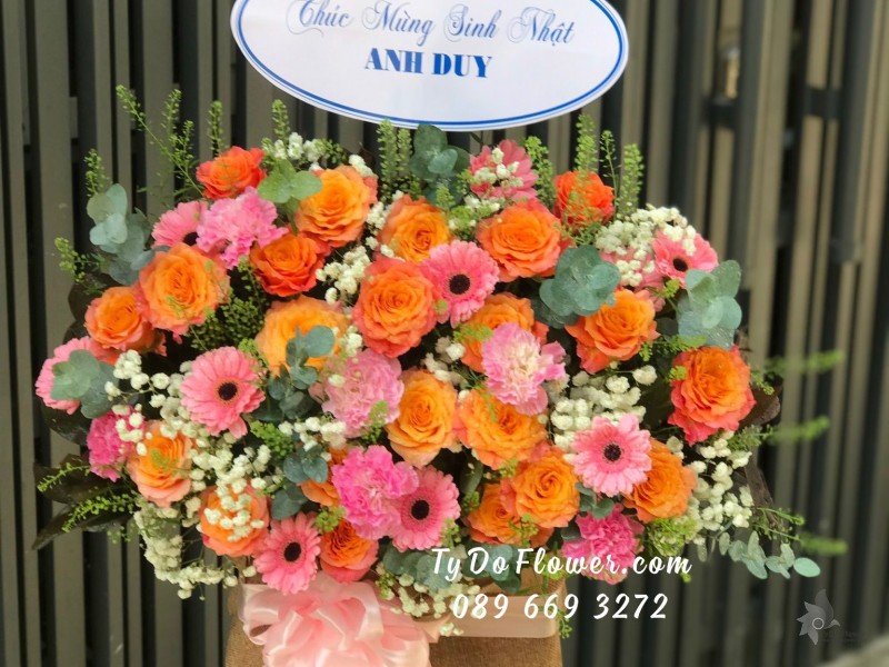G11231144 GIỎ HOA CHÚC MỪNG SINH NHẬT thiết kế chủ đạo hoa hồng cam Spirit Roses