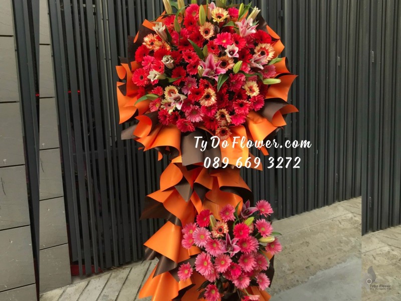 KCM12231235 KỆ HOA CHÚC MỪNG KHAI TRƯƠNG thiết kế tone màu đỏ cam
