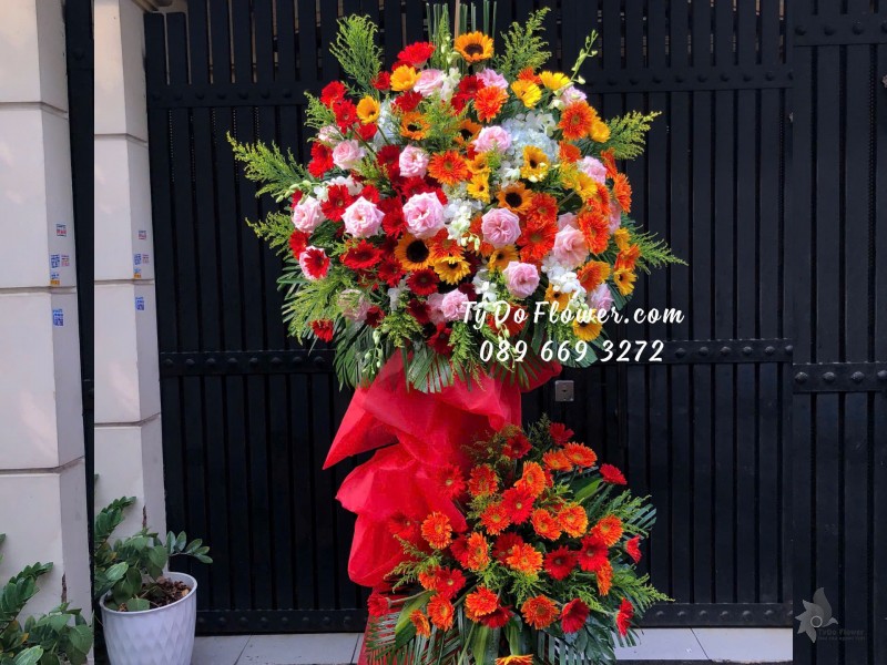 KCM10241952 KỆ HOA CHÚC MỪNG thiết kế Hoa Đa Sắc rực rỡ