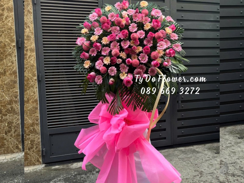 KCM01254 KỆ HOA CHÚC MỪNG TẤT NIÊN Thiết kế tông màu hồng, chủ đạo Hoa Hồng Sen Phật, Đồng Tiền Mini, Cúc Pingpong