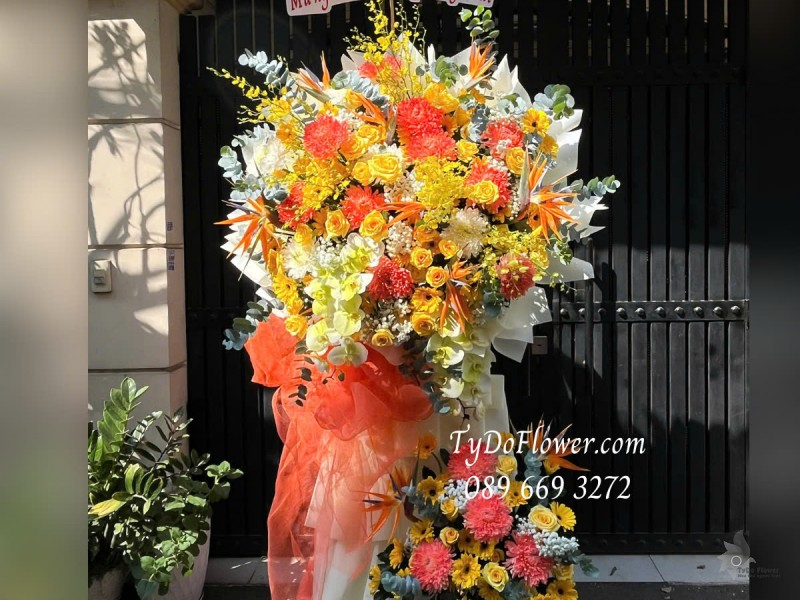 KCM0425333 KỆ HOA CHÚC MỪNG KHAI TRƯƠNG HỒNG PHÁT Thiết kế 02 tầng hoa, Hoa Hồng Vàng Gold, Lan Vũ Nữ, Cúc Mẫu Đơn, Thiên Điểu, Đồng Tiền, Lan Hồ Điệp