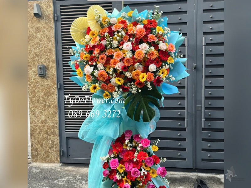 KCM0425334 KỆ HOA CHÚC MỪNG Thiết kế 02 tầng hoa đa sắc