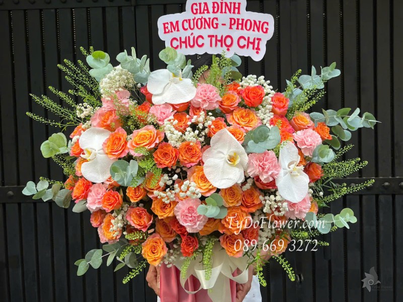 G0525417 GIỎ HOA CHÚC THỌ Thiết kế Hoa Hồng Cam Spirit, Cẩm Chướng Phăng Phồng, Lan Hồ Điệp
