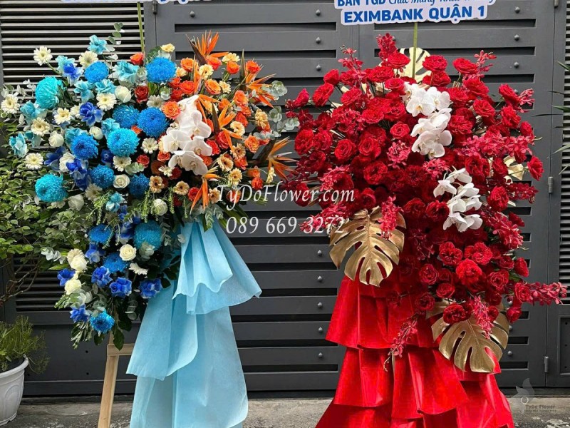 KCM0625492 MỘT CẶP KỆ HOA CHÚC MỪNG KHAI TRƯƠNG Thiết kế gam màu Đỏ Cam Xanh Dương