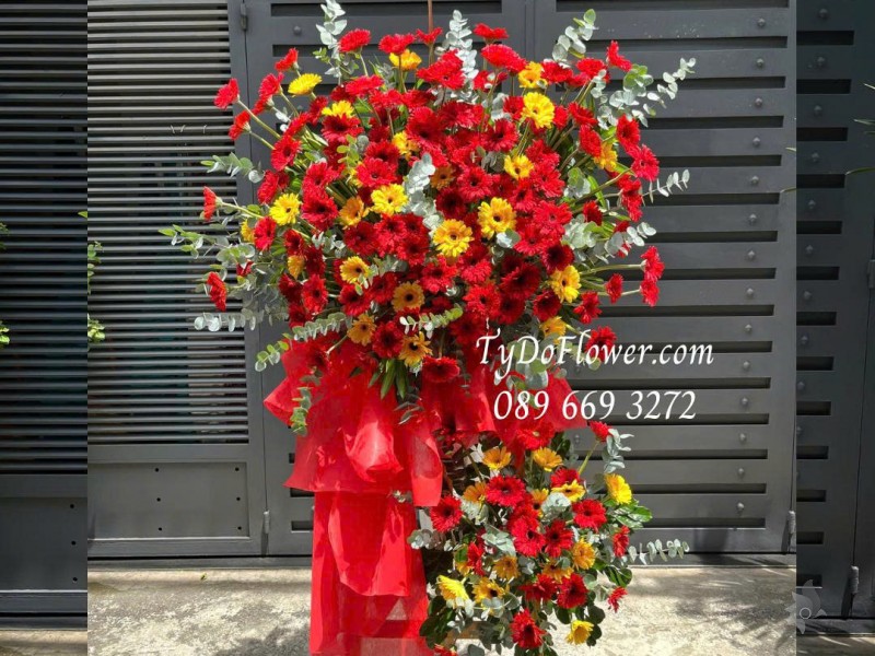 KCM0725505 KỆ HOA CHÚC MỪNG KHAI TRƯƠNG HỒNG PHÁT Thiết kế hoa đồng tiền