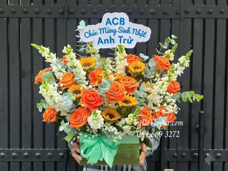 G1125894 GIỎ HOA CHÚC MỪNG SINH NHẬT Thiết kế hoa hồng Cam Spirit, hướng dương, mõm sói