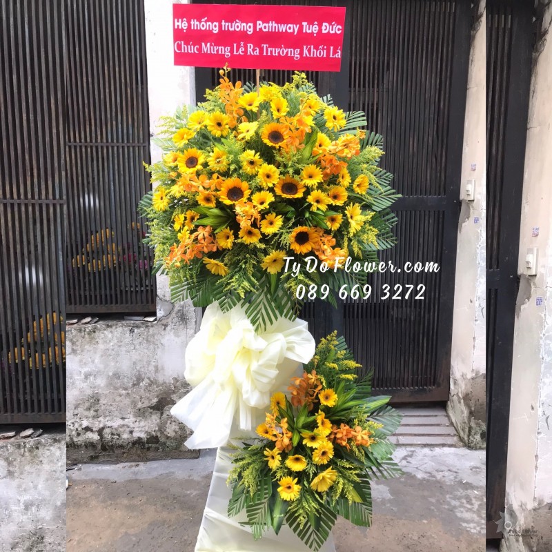 KCM0523675 KỆ HOA CHÚC MỪNG LỄ RA TRƯỜNG KHỐI LÁ