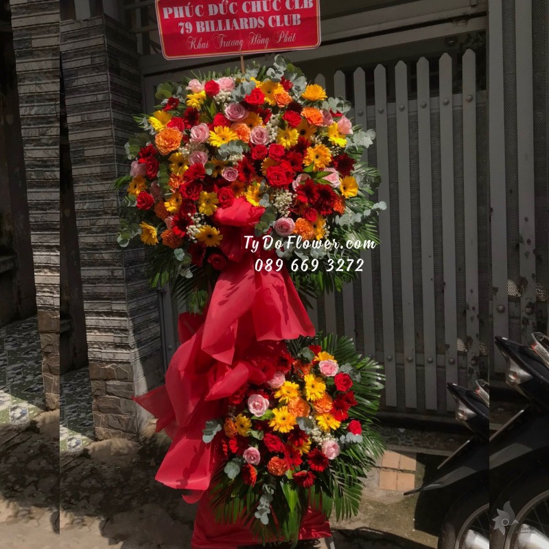 KCM10231096 KỆ HOA CHÚC MỪNG KHAI TRƯƠNG HỒNG PHÁT thiết kế tone màu đỏ vàng hồng cam