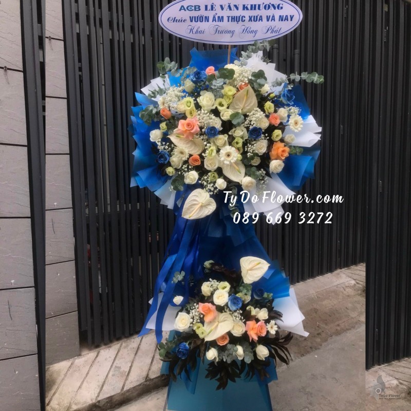 KCM12231205 KỆ HOA CHÚC MỪNG KHAI TRƯƠNG HỒNG PHÁT thiết kế tone màu trắng xanh dương
