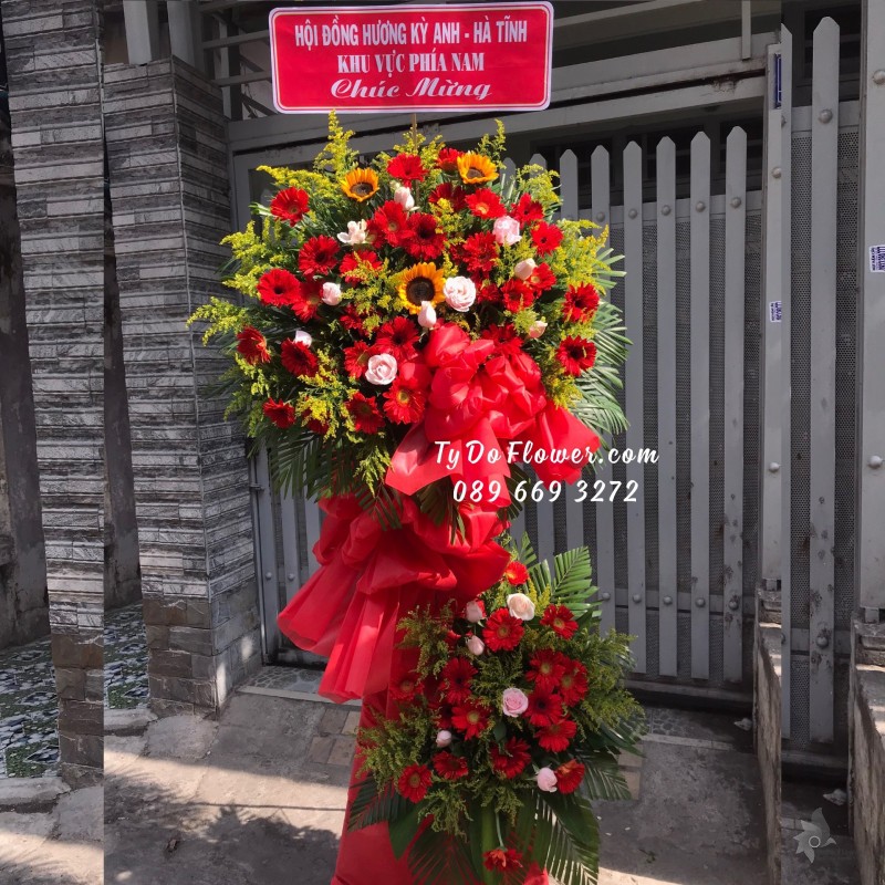 KCM03241395 KỆ HOA CHÚC MỪNG thiết kế tone màu đỏ