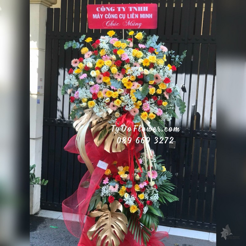 KCM06241671 KỆ HOA CHÚC MỪNG thiết kế tông màu đa sắc rực rỡ