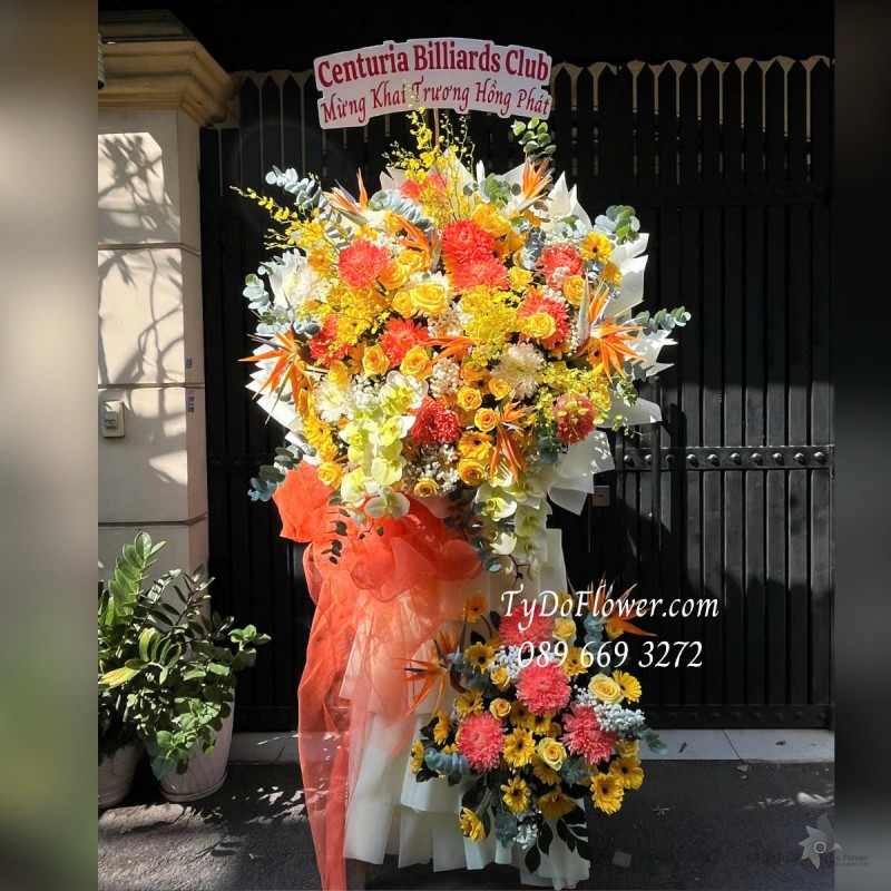 KCM0425333 KỆ HOA CHÚC MỪNG KHAI TRƯƠNG HỒNG PHÁT Thiết kế 02 tầng hoa, Hoa Hồng Vàng Gold, Lan Vũ Nữ, Cúc Mẫu Đơn, Thiên Điểu, Đồng Tiền, Lan Hồ Điệp