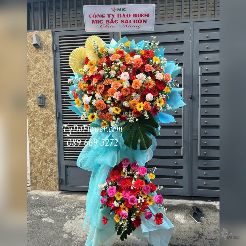 KCM0425334 KỆ HOA CHÚC MỪNG Thiết kế 02 tầng hoa đa sắc