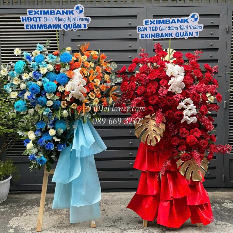 KCM0625492 MỘT CẶP KỆ HOA CHÚC MỪNG KHAI TRƯƠNG Thiết kế gam màu Đỏ Cam Xanh Dương