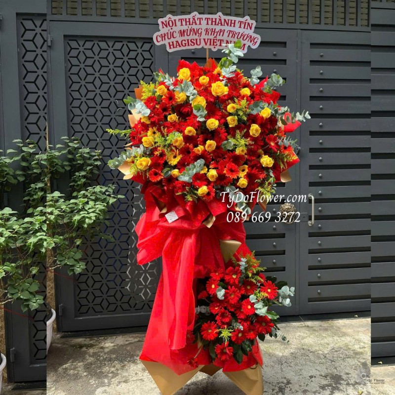 KCM0925728 KỆ HOA CHÚC MỪNG KHAI TRƯƠNG Thiết kế hoa hồng vàng Gold, đồng tiền đỏ, trên nền giấy mỹ thuật cao cấp