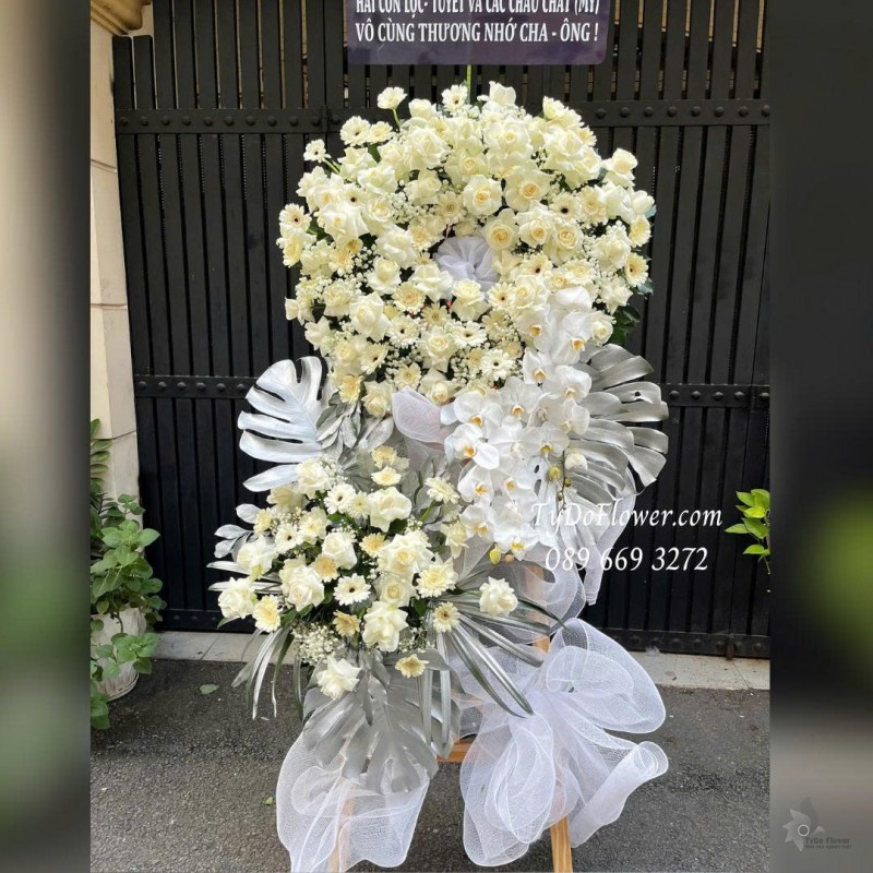 KCB0925738 KỆ HOA TANG LỄ VÒNG HOA CHIA BUỒN Hoa Kính Viếng Thiết kế 02 tầng, hoa hồng, đồng tiền, lan hồ điệp