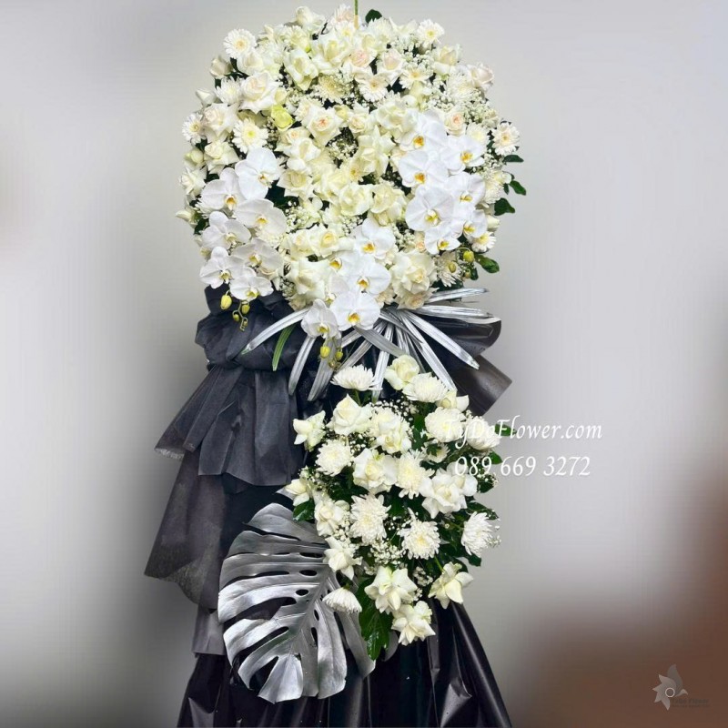 KCB0925750 KỆ HOA TANG LỄ VÒNG HOA CHIA BUỒN Hoa Kính Viếng Thiết kế 02 tầng, hoa hồng, lan hồ điệp, mõm sói, cúc, baby trắng