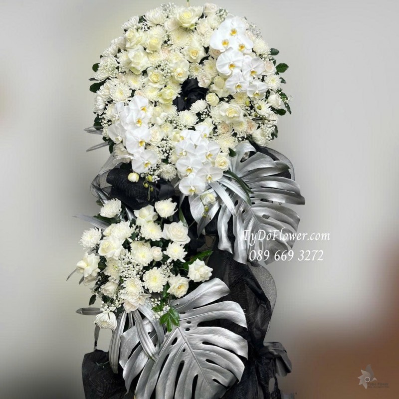 KCB0925751 KỆ HOA TANG LỄ VÒNG HOA CHIA BUỒN Hoa Kính Viếng Thiết kế 02 tầng, hoa hồng, lan hồ điệp, mõm sói, cúc, baby trắng